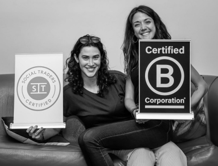 HAG staff with B-Corp and Social Traders logos