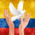 Hands releasing white dove in front of colombian flag